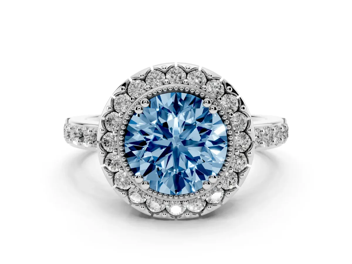 Fancy Blue Round Cut Diamond Halo Ring Set in White gold with Pavé Shank and Prong Setting