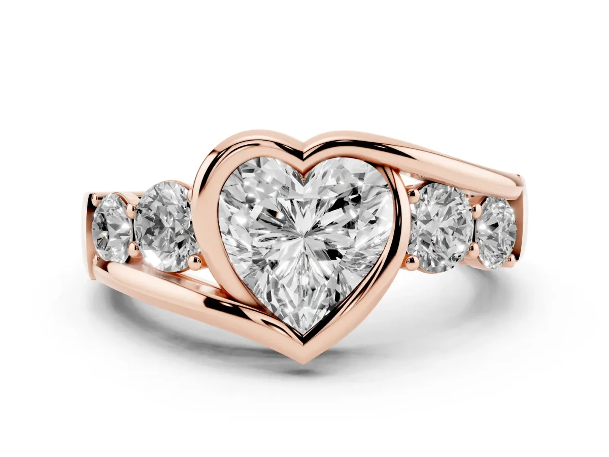 Heart Cut Diamond Bezel Bypass Ring Set in Rose gold with Round Accents