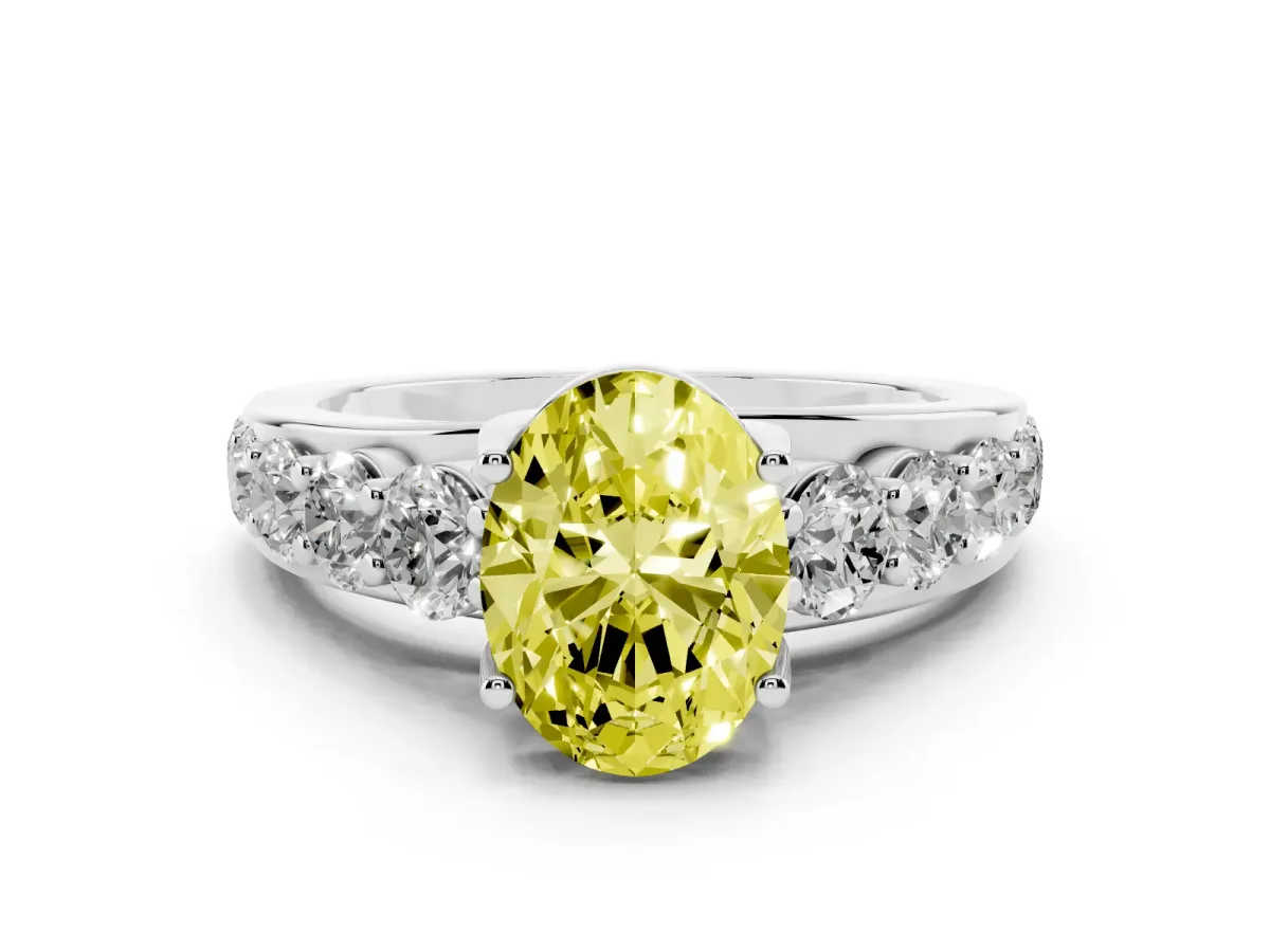 Fancy Yellow Oval Cut Diamond Pavé Engagement Ring Set in Silver with Prong Setting