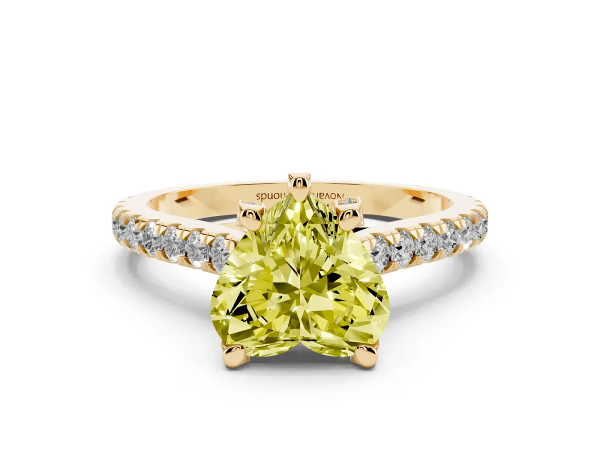 Fancy Yellow Heart Cut Diamond Solitaire Ring Set in Yellow gold with Brilliant Pavé Band and Prong Setting