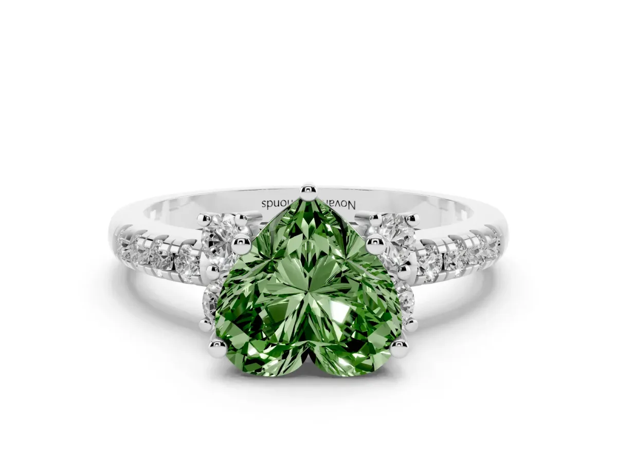 Fancy Green Heart Cut Diamond Three-Stone Pavé Ring Set in Platinum with Prong Setting