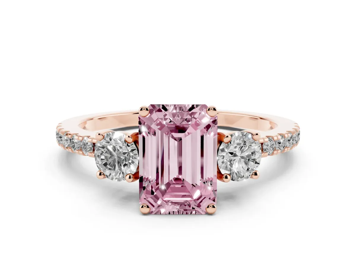 Fancy Pink Emerald Cut Diamond Three-Stone Ring Set in Rose gold with Pavé Band and Graduated Sides