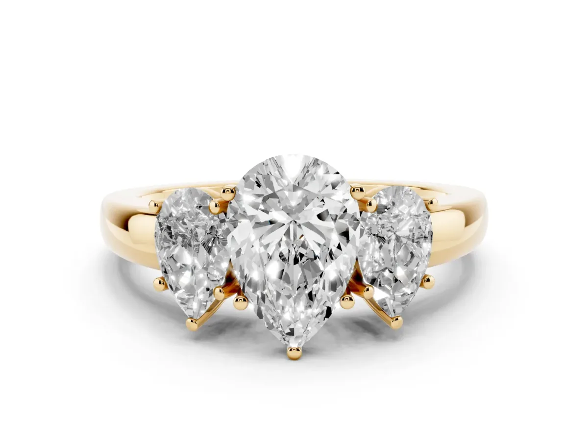 Pear Cut Diamond Three-Stone Ring Set in Yellow gold with Bold Center and Classic Band