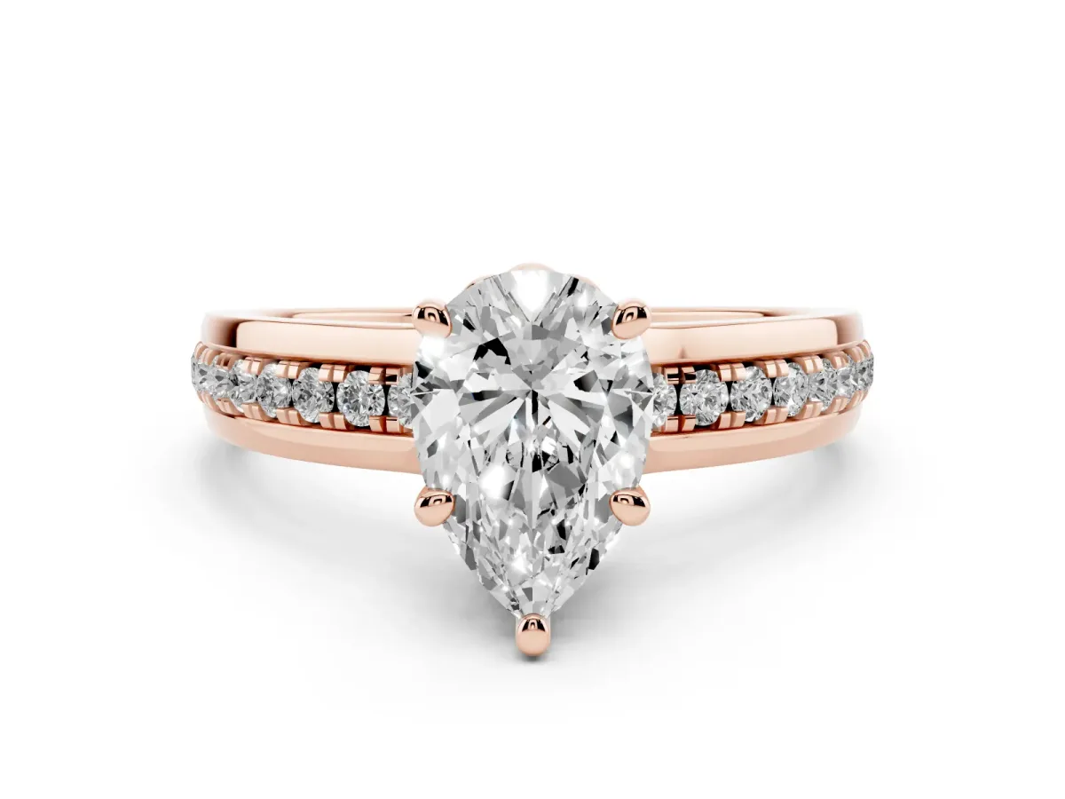 Pear Cut Diamond Solitaire Ring Set in Rose gold with Channel Set Band and Prong Setting
