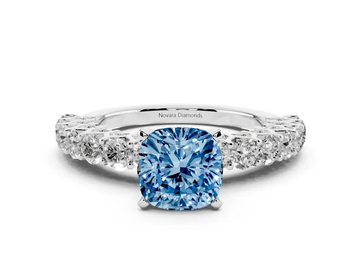 Fancy Blue Cushion Cut Diamond Solitaire Ring Set in White gold with Shared Prong Pavé Band