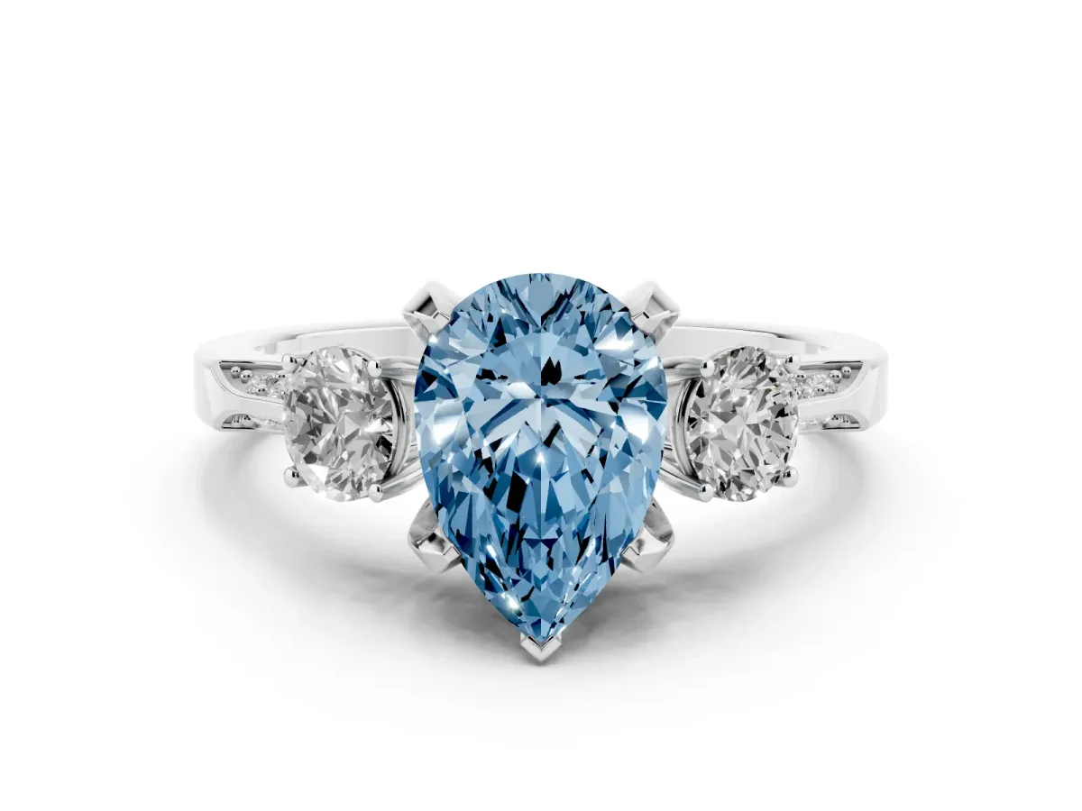 Fancy Blue Pear Cut Diamond Three-Stone Ring Set in Platinum with Pavé Band and Smaller Side Stones