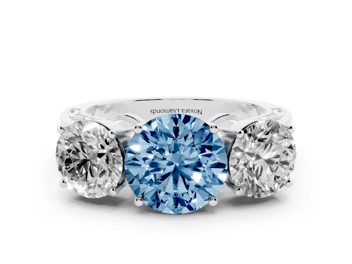 Fancy Blue Round Cut Diamond Three-Stone Ring Set in White gold with Textured Band