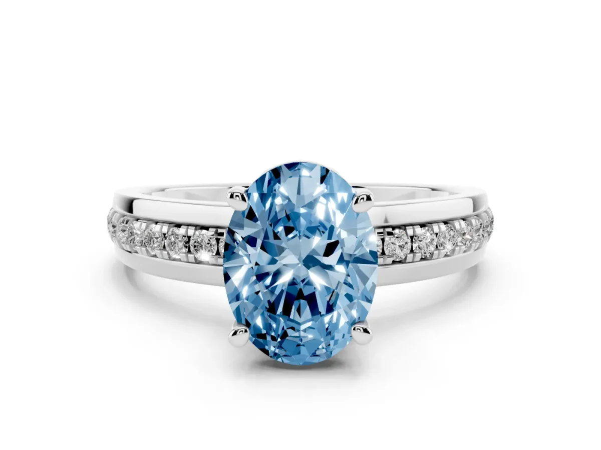 Fancy Blue Oval Cut Diamond Solitaire Ring Set in Platinum with Channel Set Band and Prong Setting