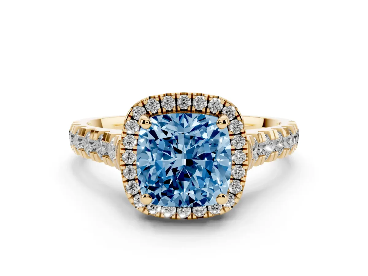 Fancy Blue Cushion Cut Diamond Halo Engagement Ring Set in Yellow gold with Pavé Band and Prong-Set Center
