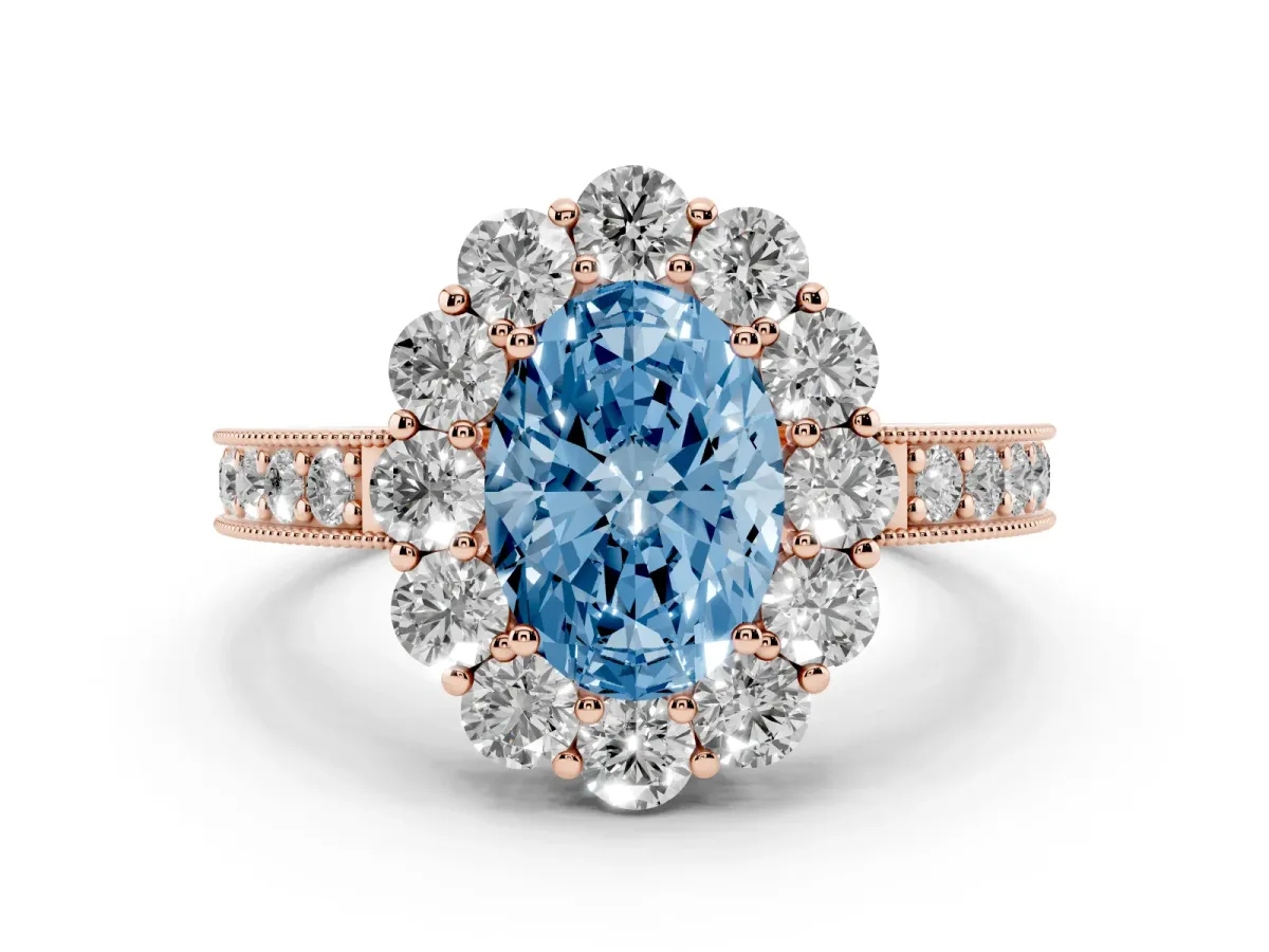 Fancy Blue Oval Cut Diamond Halo Pavé Engagement Ring Set in Rose gold with Milgrain Detailing