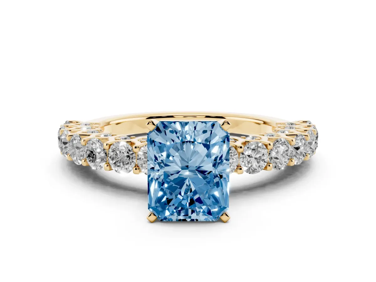 Fancy Blue Radiant Cut Diamond Solitaire Ring Set in Yellow gold with Shared Prong Pavé Band