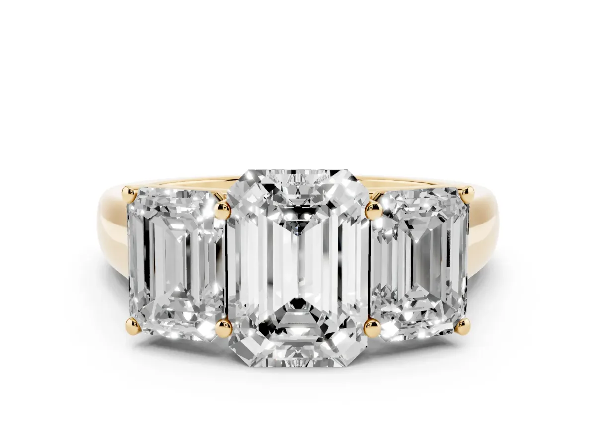 Emerald Cut Diamond Three-Stone Ring Set in Yellow gold with Plain Polished Band