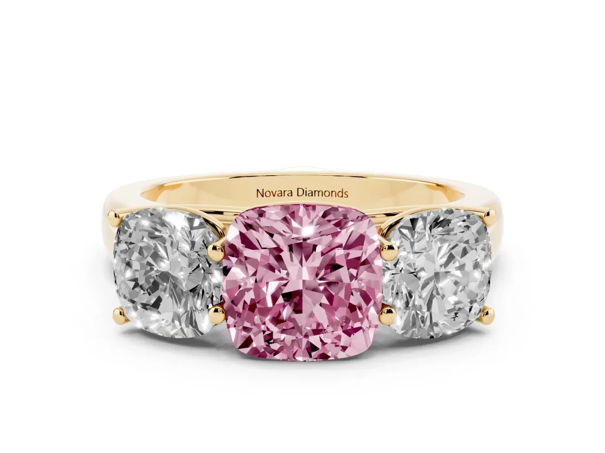 Fancy Pink Cushion Cut Diamond Three-Stone Ring Set in Yellow gold with Plain Polished Band