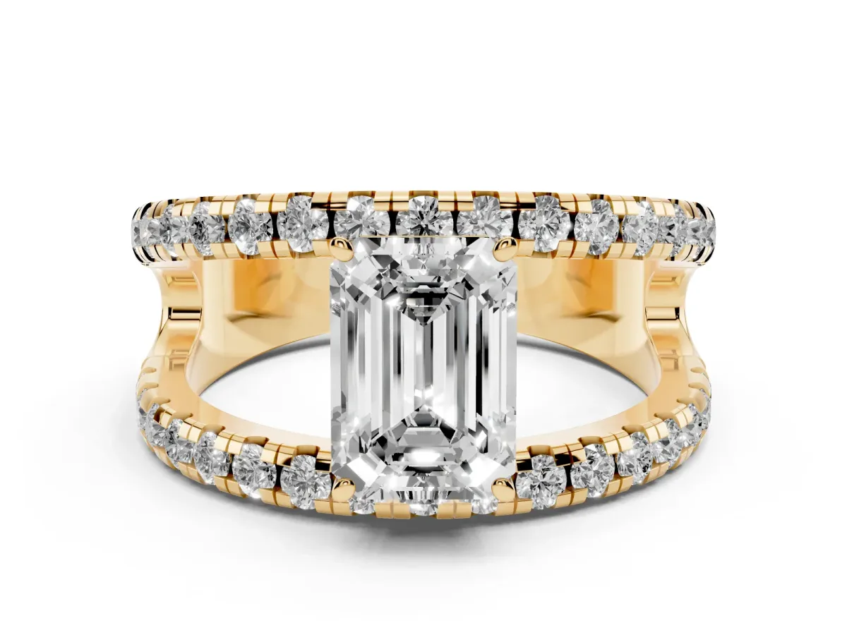 Emerald Cut Diamond Split Shank Pavé Solitaire Ring Set in Yellow gold with Open Shank Design