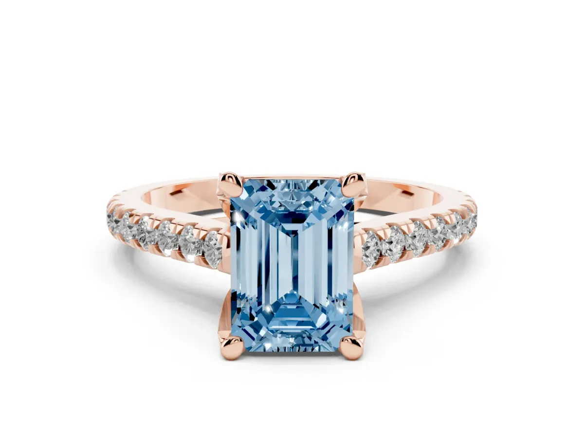Fancy Blue Emerald Cut Diamond Solitaire Ring Set in Rose gold with Brilliant Pavé Band and Prong Setting