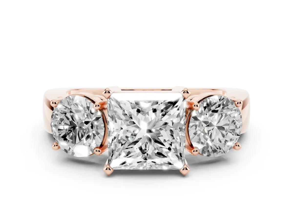 Princess Cut Diamond Three-Stone Ring Set in Rose gold with Round Side Stones and Classic Band