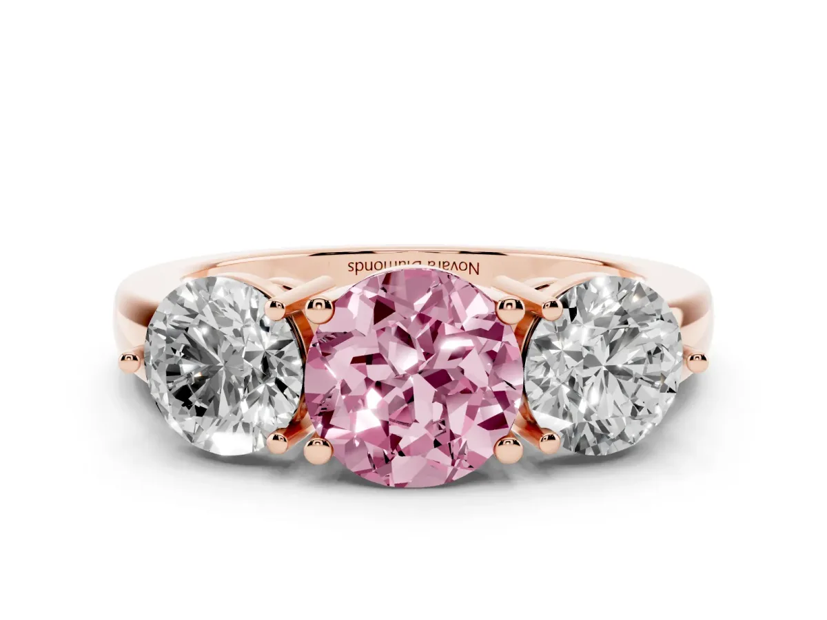 Fancy Pink Round Cut Diamond Three-Stone Ring Set in Rose gold with Prong Setting and Plain Band