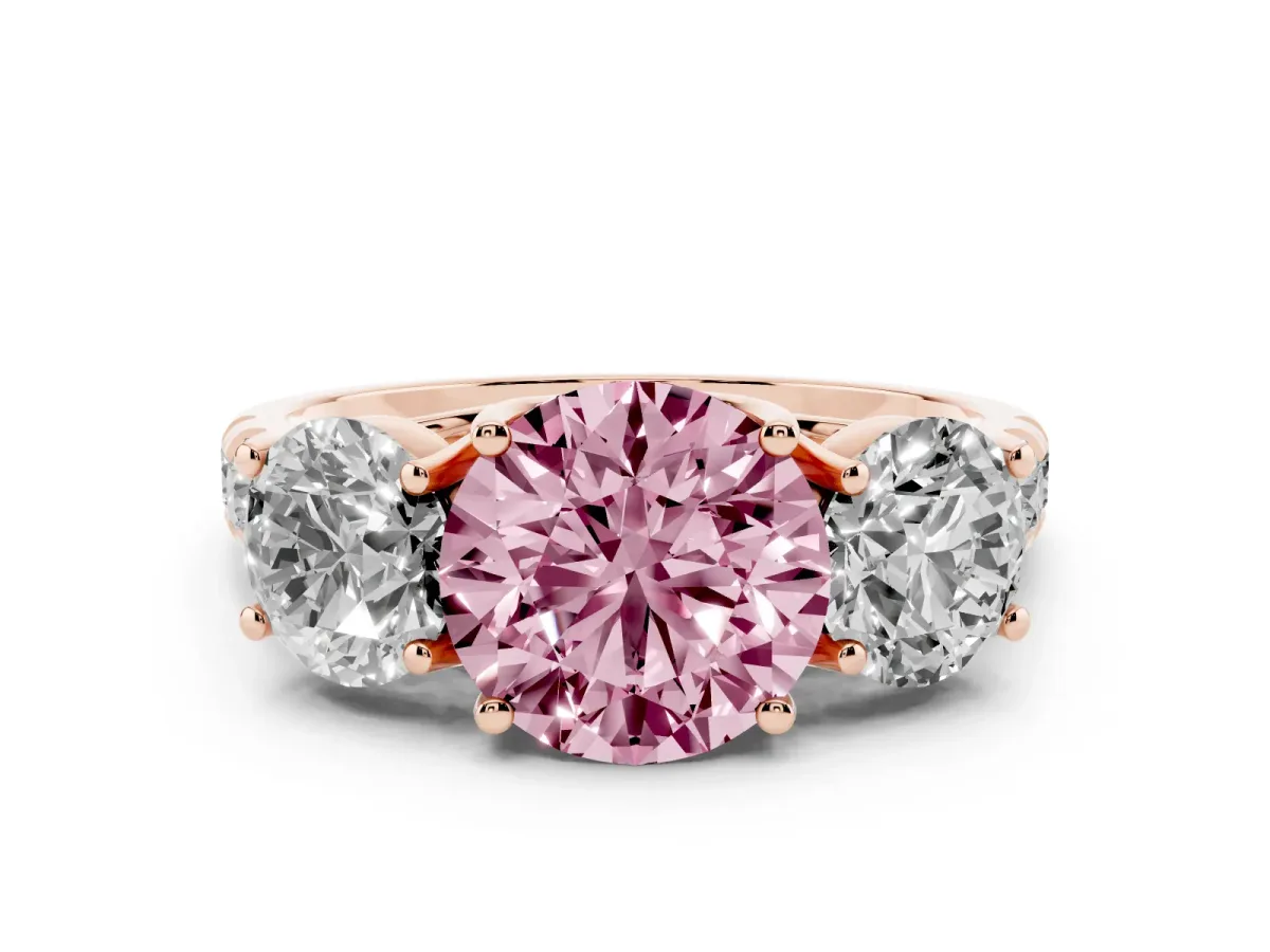 Fancy Pink Round Cut Diamond Three-Stone Ring Set in Rose gold with Pavé Band