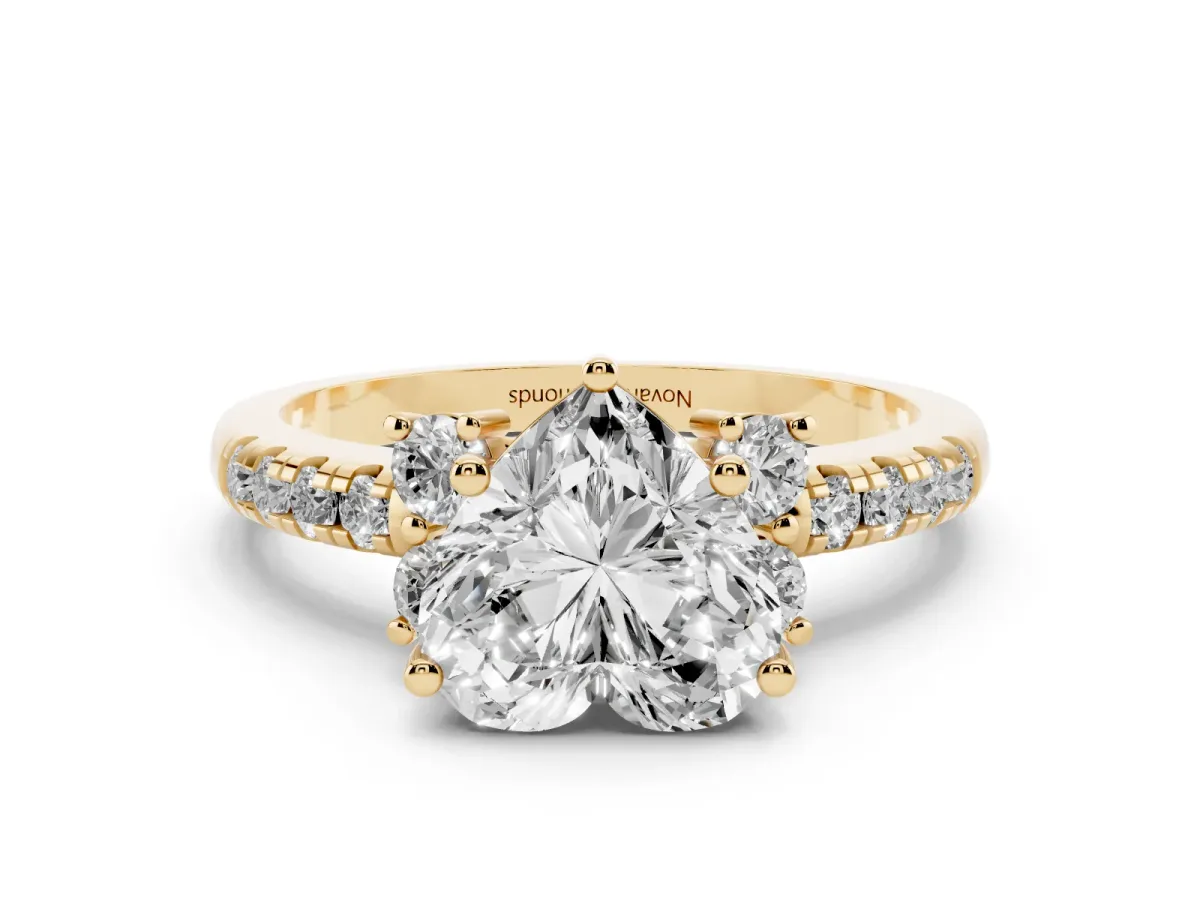 Heart Cut Diamond Three-Stone Pavé Ring Set in Yellow gold with Prong Setting