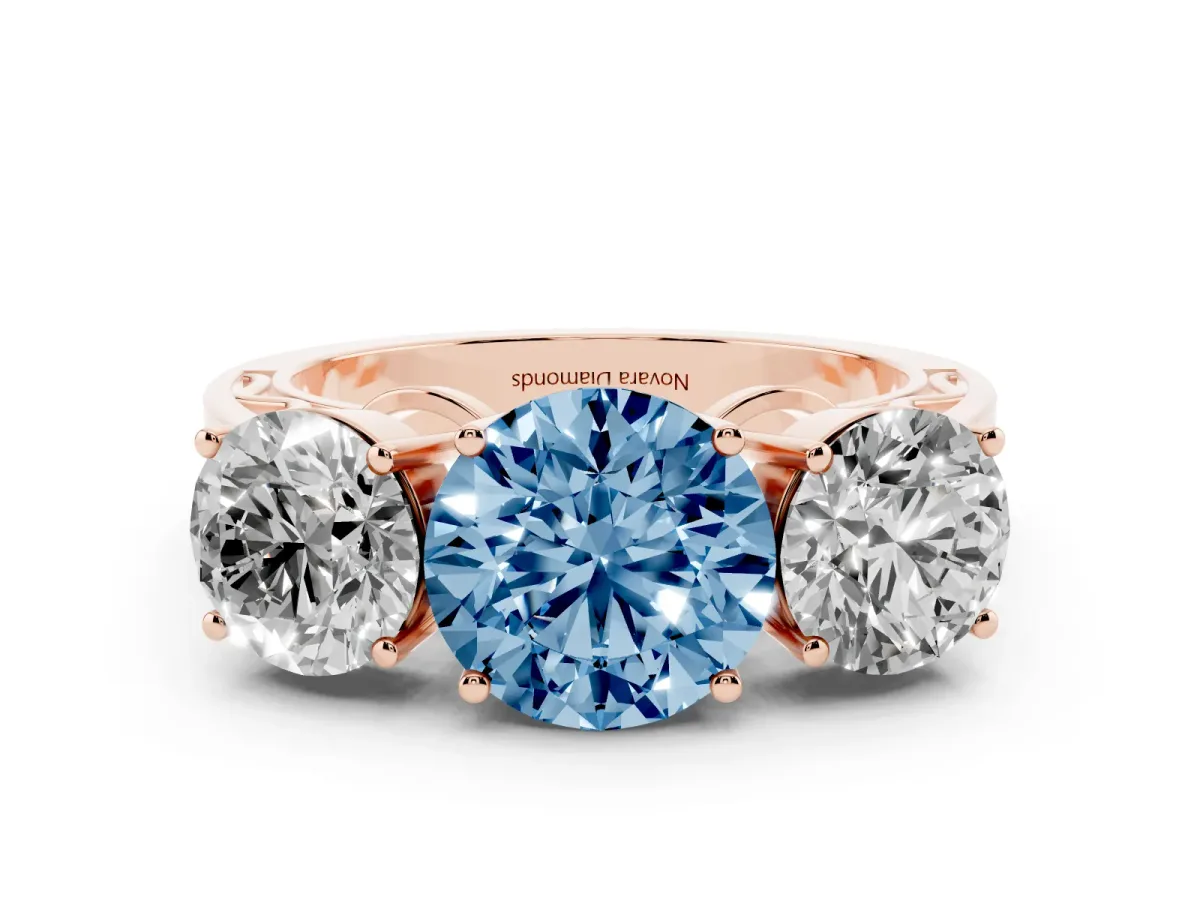 Fancy Blue Round Cut Diamond Three-Stone Ring Set in Rose gold with Textured Band