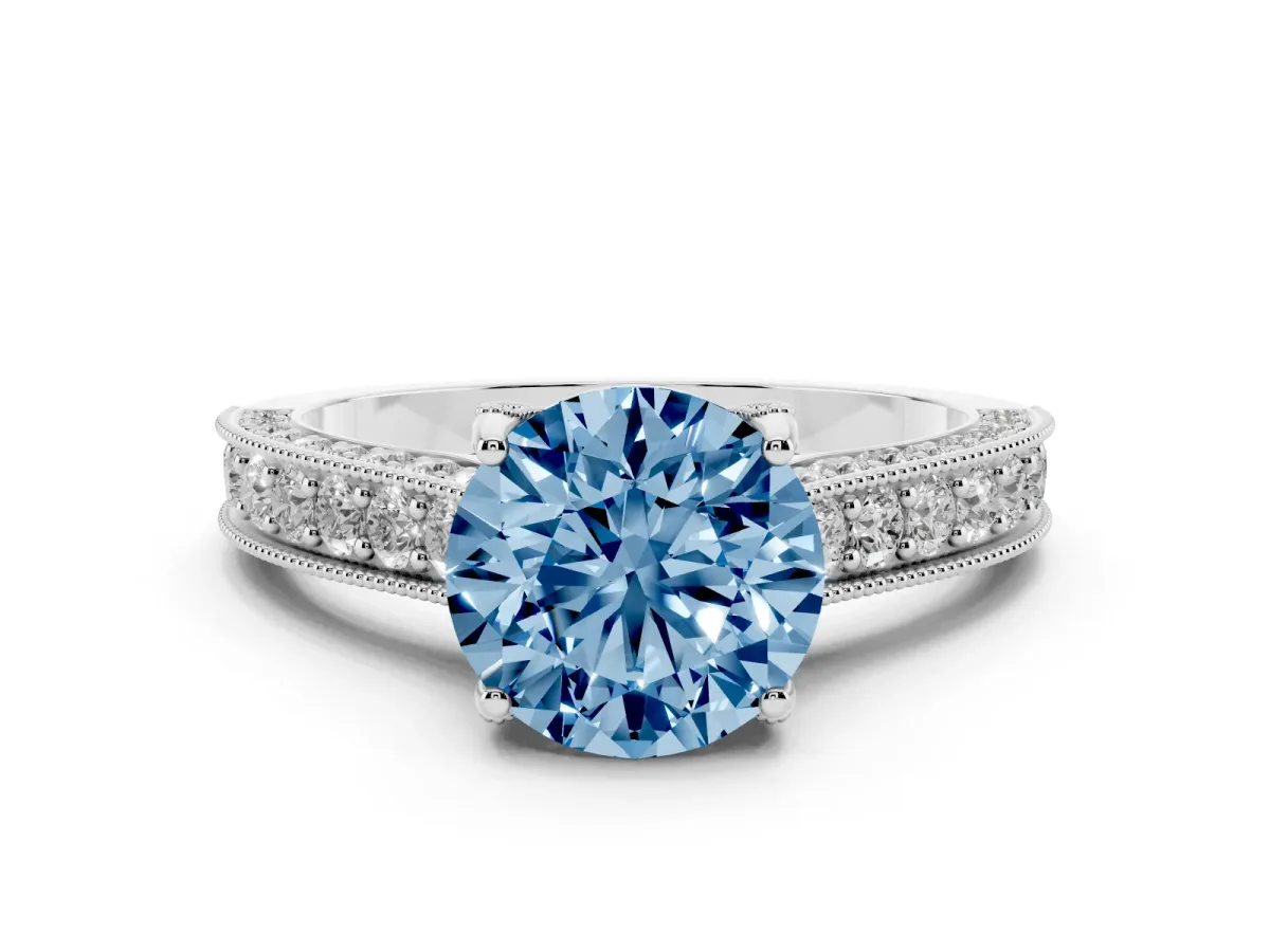 Fancy Blue Round Cut Diamond Solitaire Ring Set in Silver with Milgrain-Edged Pavé Band and Prong Setting