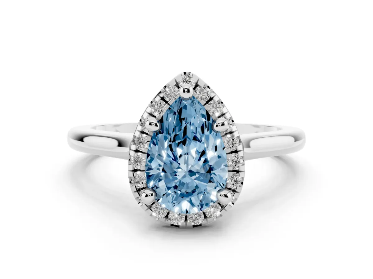 Fancy Blue Pear Cut Diamond Halo Engagement Ring Set in White gold with Pavé Band and Rising Shoulders