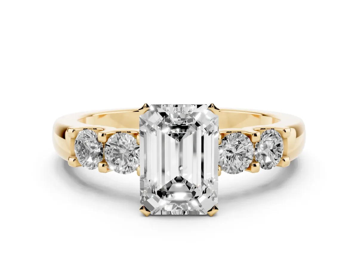 Emerald Cut Diamond Five-Stone Prong Set Engagement Ring Set in Yellow gold with Channel Band