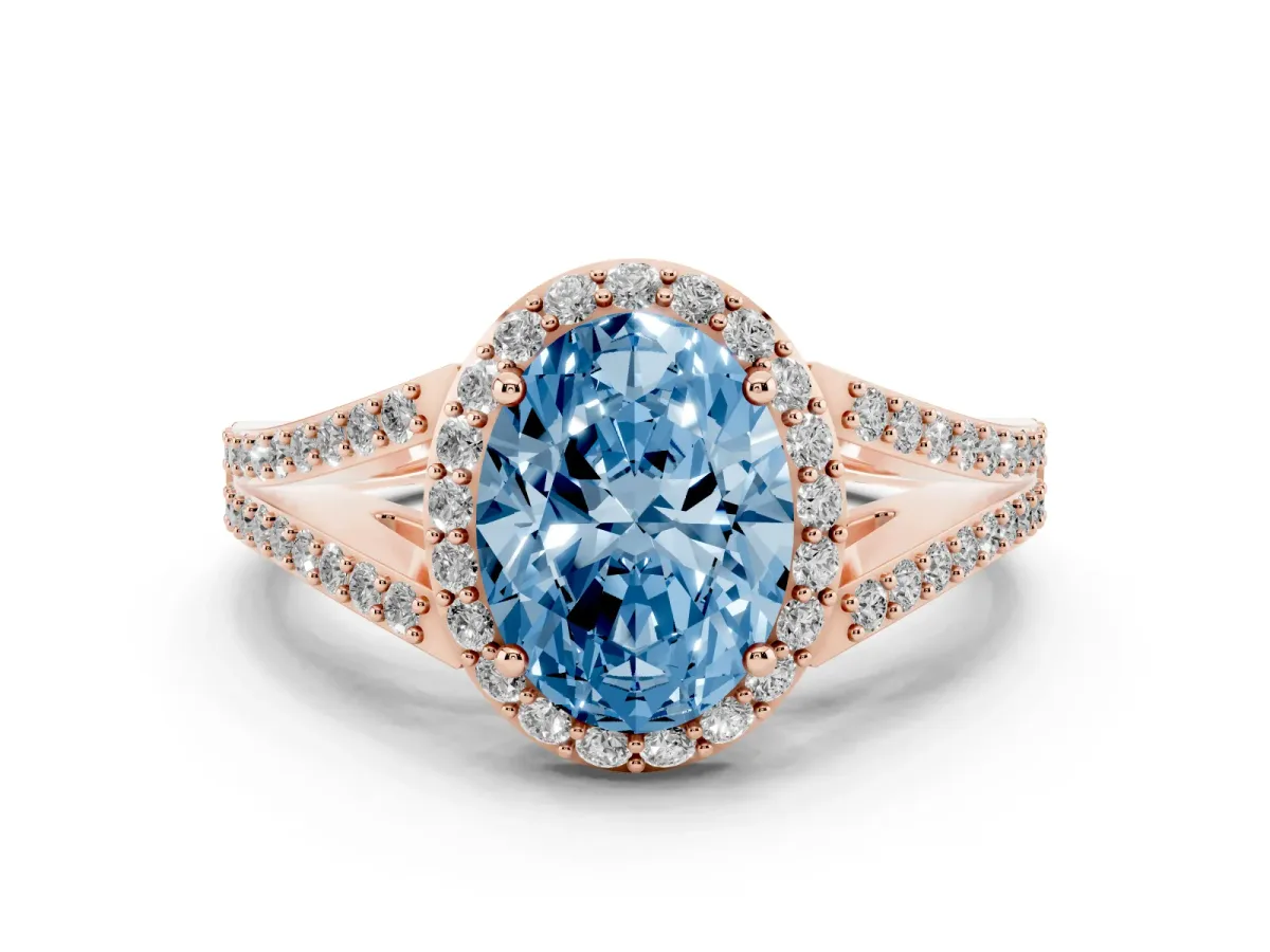 Fancy Blue Oval Cut Diamond Halo Split Shank Pavé Ring Set in Rose gold with Prong Setting