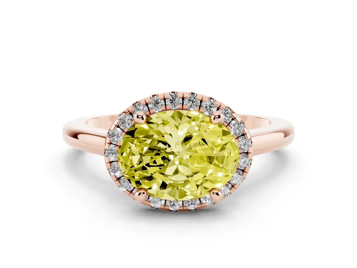 Fancy Yellow Oval Cut Diamond Halo Engagement Ring Set in Rose gold with Pavé Band and Rising Shoulders