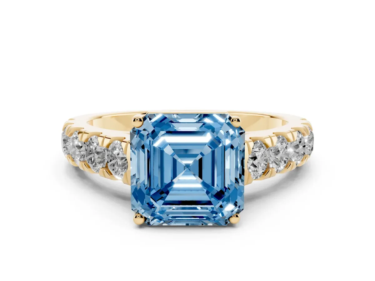 Fancy Blue Asscher Cut Diamond Solitaire Ring Set in Yellow gold with Cut-Down Micro Pavé Band and Prong Setting