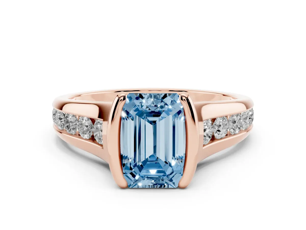 Fancy Blue Emerald Cut Diamond Bezel-Set Solitaire Ring Set in Rose gold with Channel-Set Band