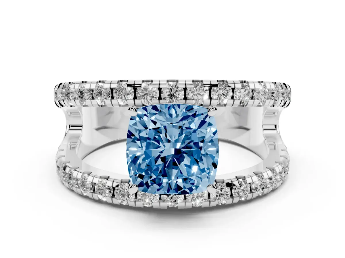 Fancy Blue Cushion Cut Diamond Split Shank Pavé Solitaire Ring Set in White gold with Open Shank Design