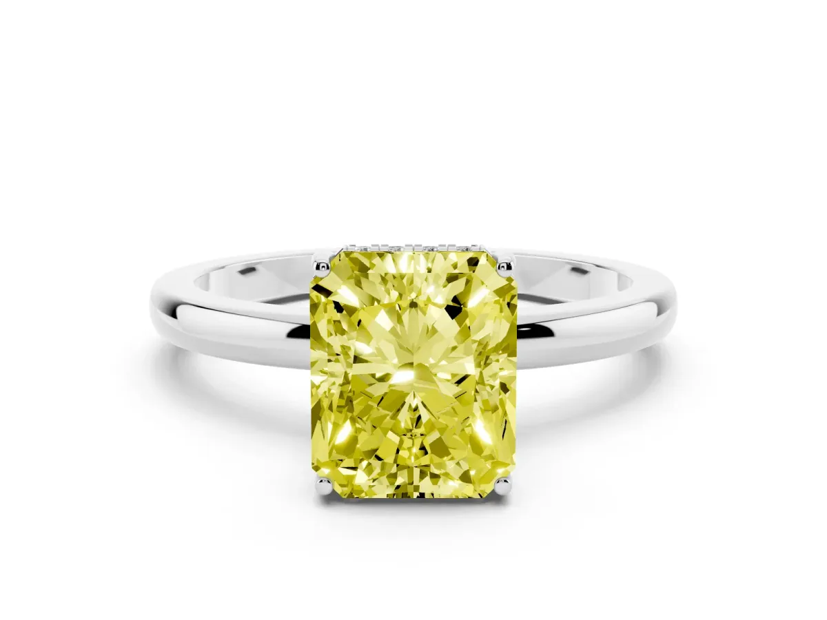 Fancy Yellow Radiant Cut Diamond Solitaire Ring Set in White gold with Plain Band and Prong Setting