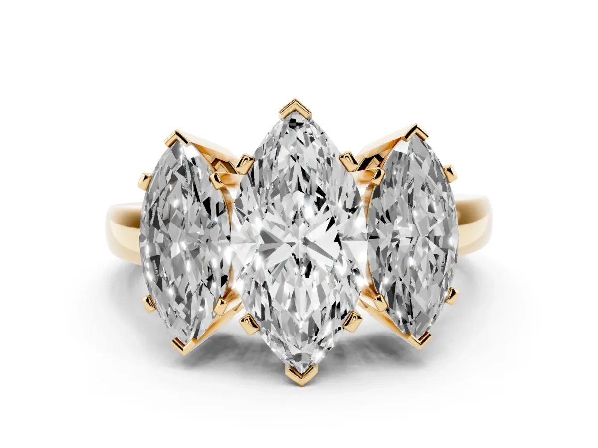 Marquise Cut Diamond Three-Stone Ring Set in Yellow gold with Channel-Set Band and Prong Settings