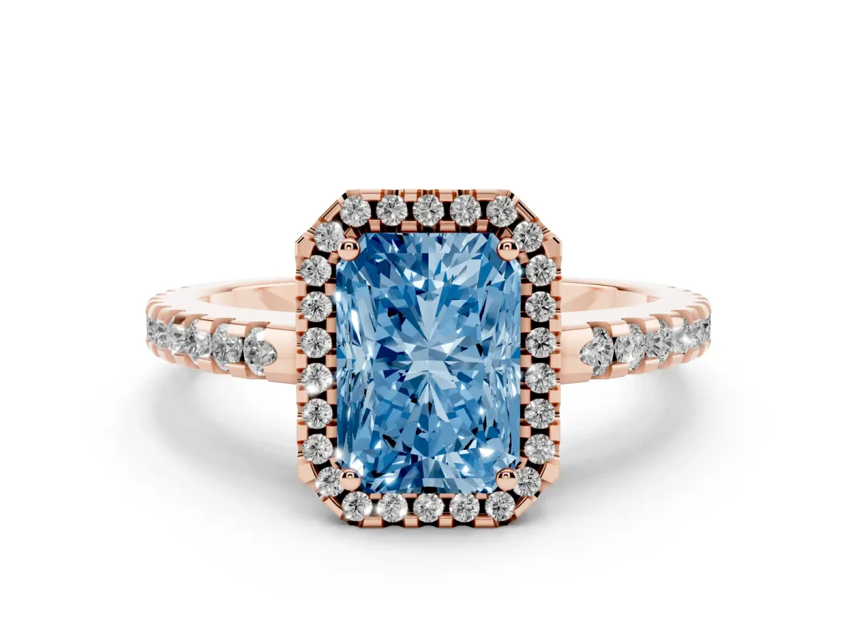 Fancy Blue Radiant Cut Diamond Halo Ring Set in Rose gold with Pavé Shoulders and Halo-Framed Center