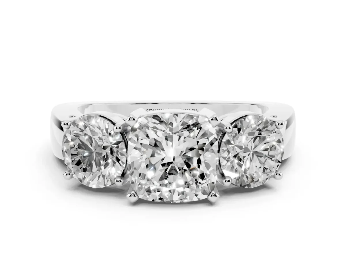 Cushion Cut Diamond Three-Stone Ring Set in Platinum with Round Side Stones and Classic Band