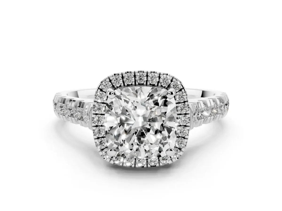 Cushion Cut Diamond Halo Engagement Ring Set in Silver with Pavé Band and Prong-Set Center