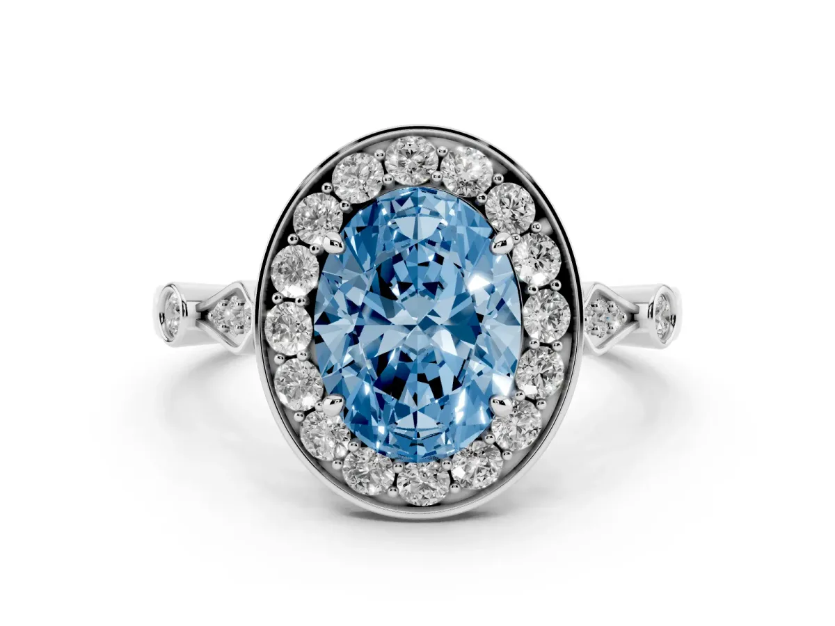 Fancy Blue Oval Cut Diamond Halo Engagement Ring Set in White gold with Twisted Band and Prong Setting