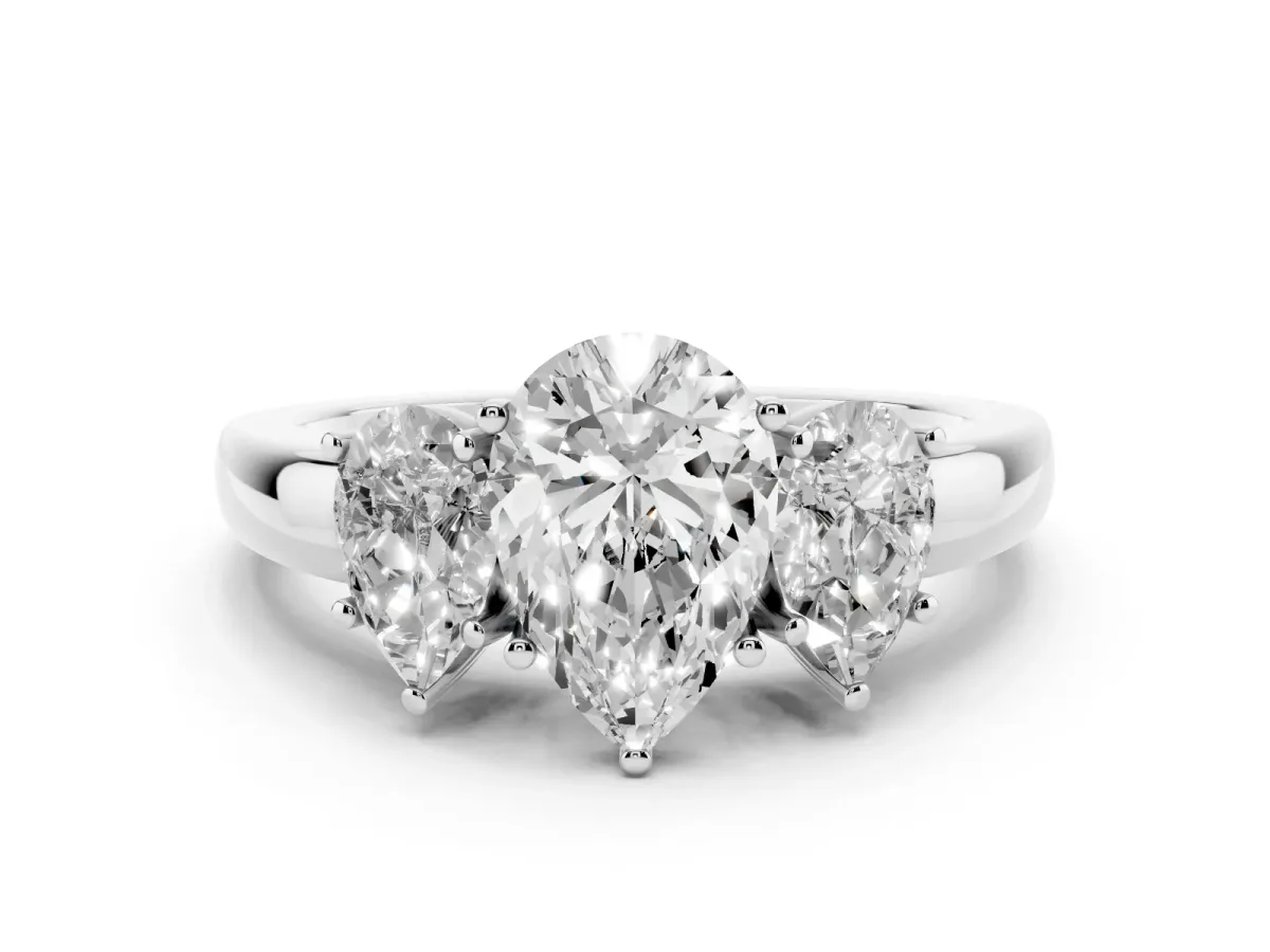 Pear Cut Diamond Three-Stone Ring Set in White gold with Bold Center and Classic Band