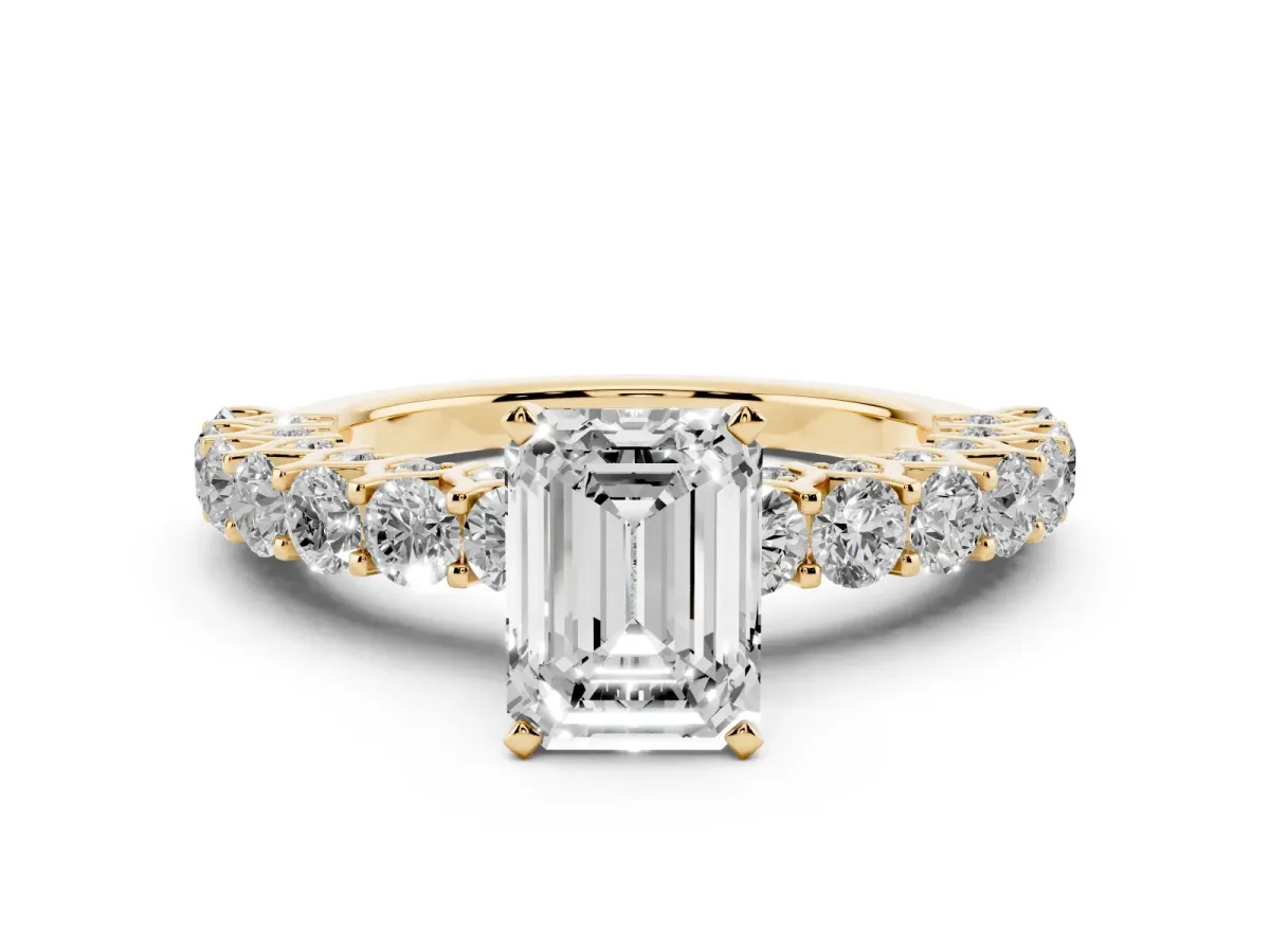 Emerald Cut Diamond Solitaire Ring Set in Yellow gold with Shared Prong Pavé Band
