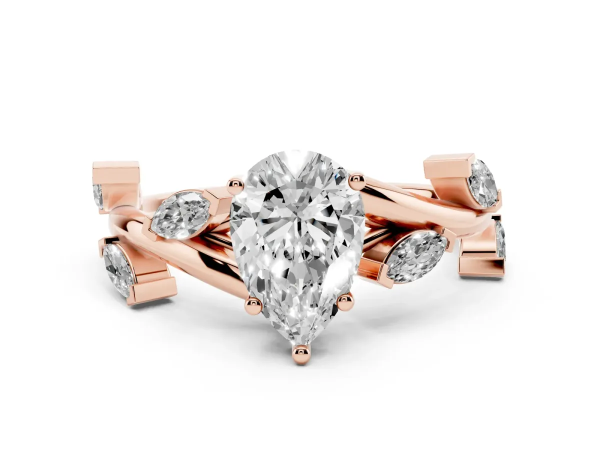 Pear Cut Diamond Solitaire Ring Set in Rose gold with Twisted Marquise Accent Band