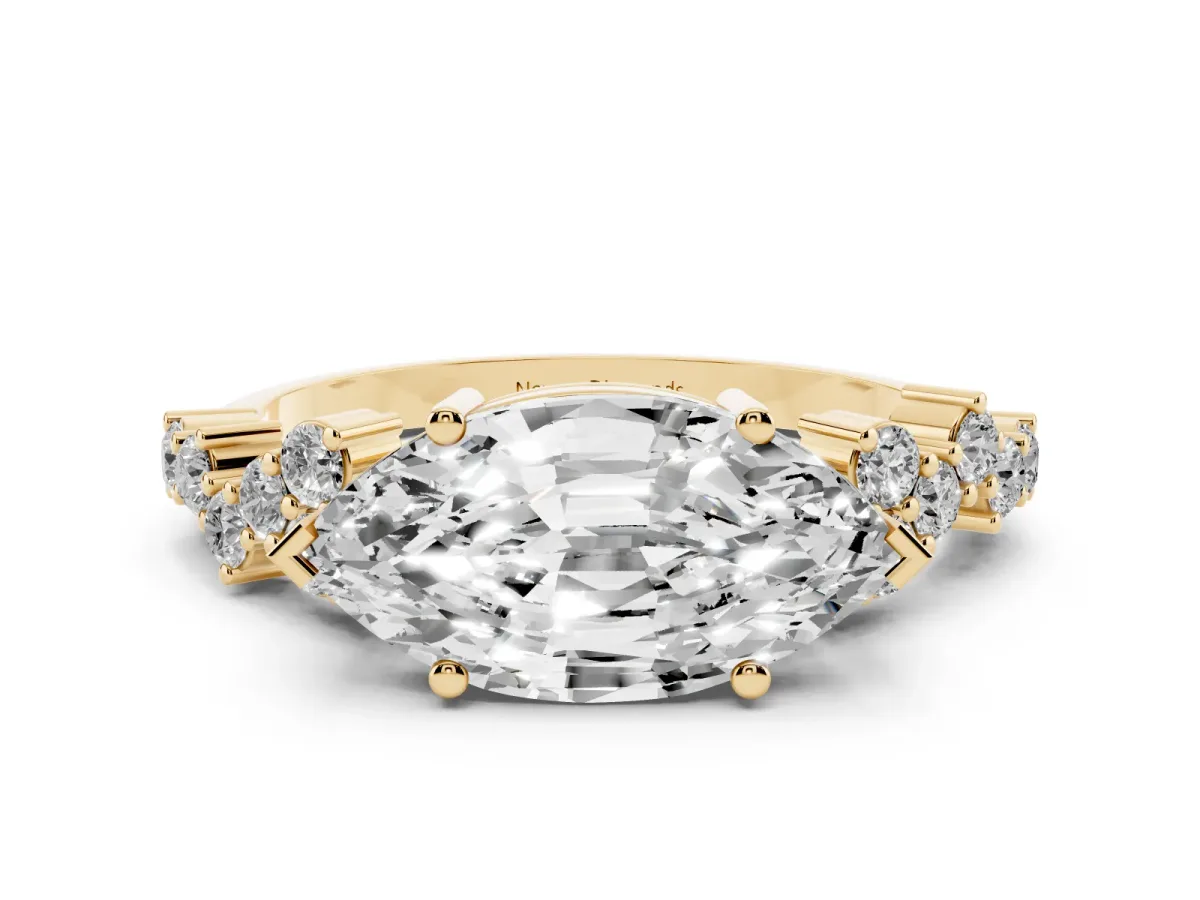 Marquise Cut Diamond Ring Set in Yellow gold with Scattered Round Accents
