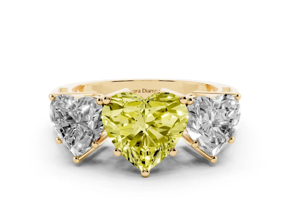 Fancy Yellow Heart Cut Diamond Three-Stone Ring Set in Yellow gold with Textured Band