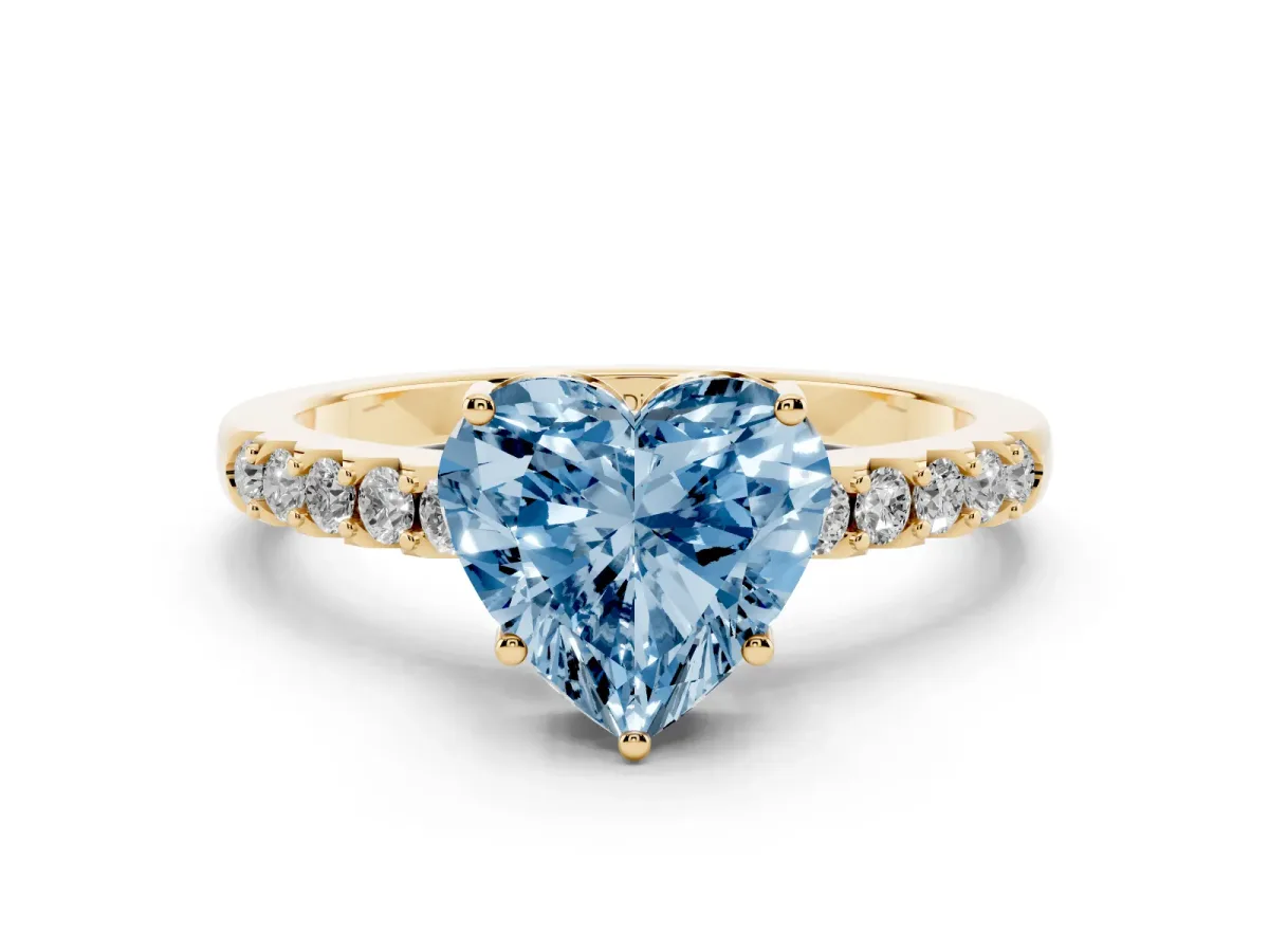Fancy Blue Heart Cut Diamond Solitaire Engagement Ring Set in Yellow gold with Pavé Band and Prong Setting