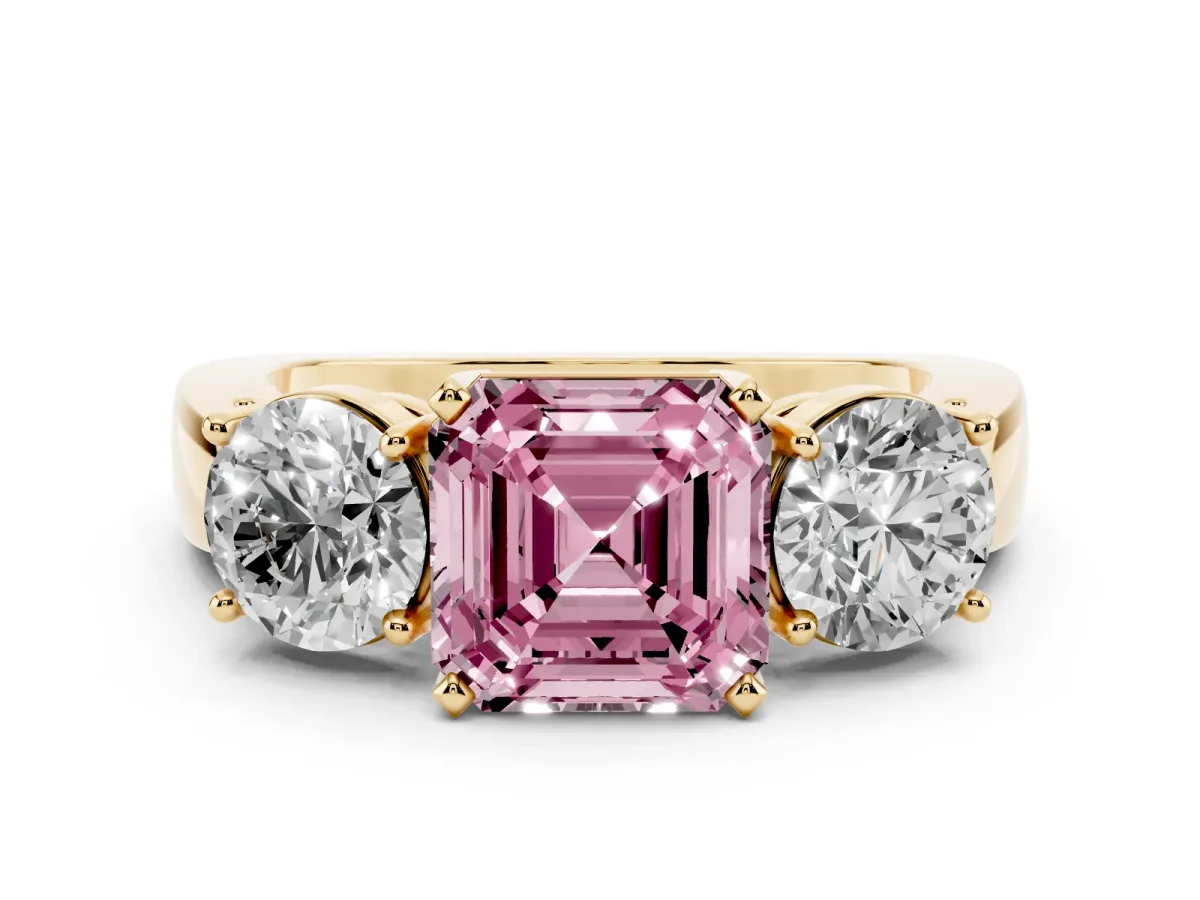 Fancy Pink Asscher Cut Diamond Three-Stone Ring Set in Yellow gold with Round Side Stones and Classic Band