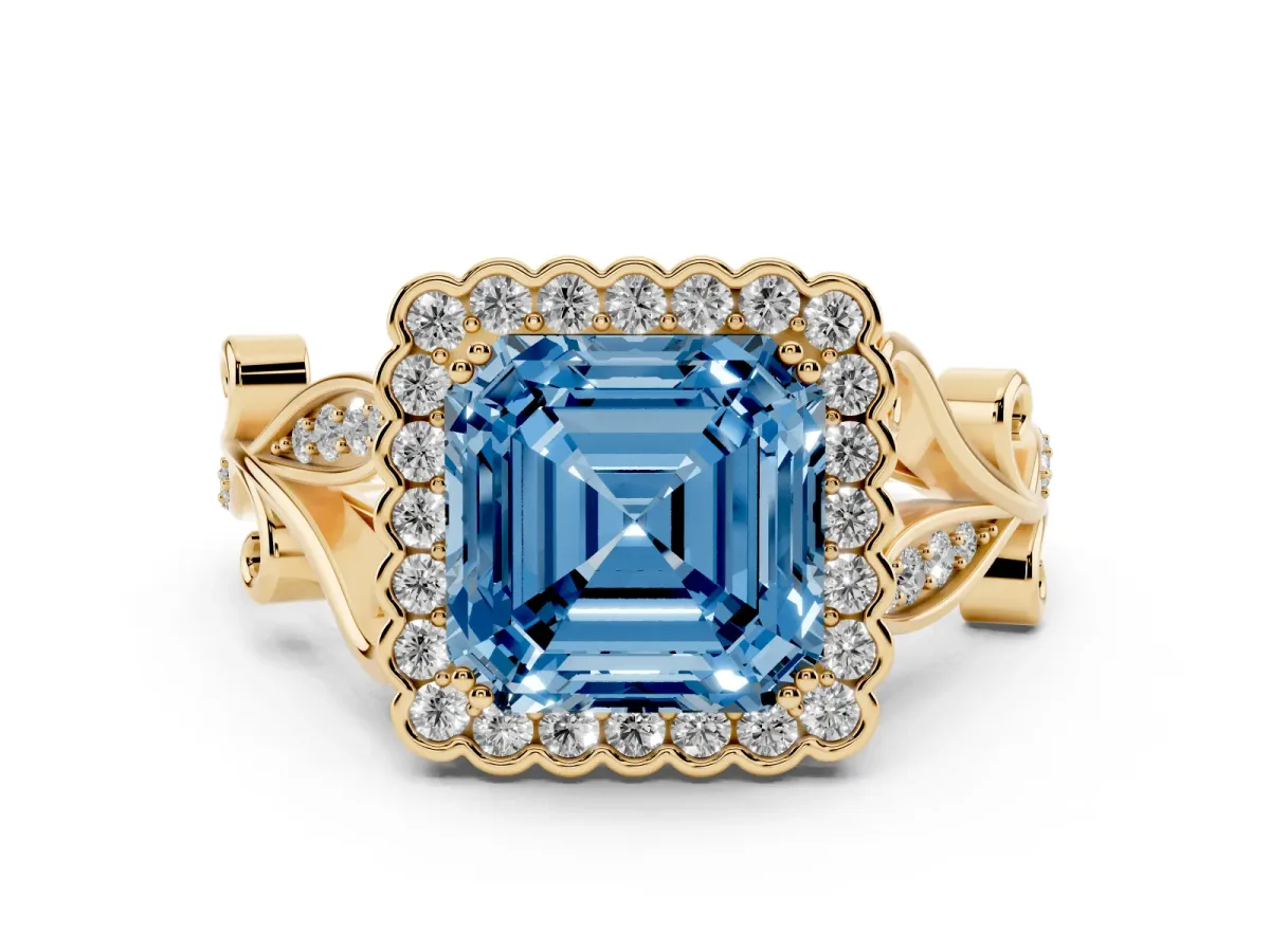 Fancy Blue Asscher Cut Diamond Halo Ring Set in Yellow gold with Leaf Motif Split Shank and Prong Setting