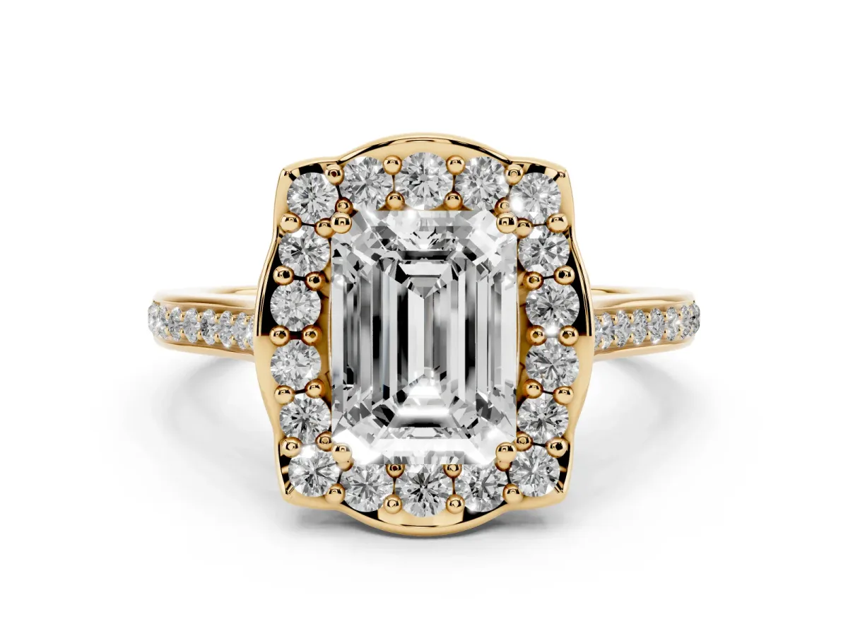 Emerald Cut Diamond Halo Ring Set in Yellow gold with Pavé-Lined Shoulders and Prong Setting