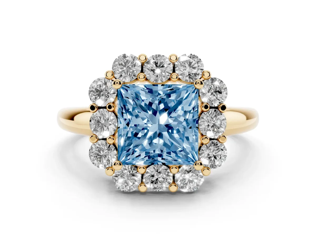 Fancy Blue Princess Cut Diamond Milgrain Halo Solitaire Ring Set in Yellow gold with Bezel Set Side Stones and Pavé Band