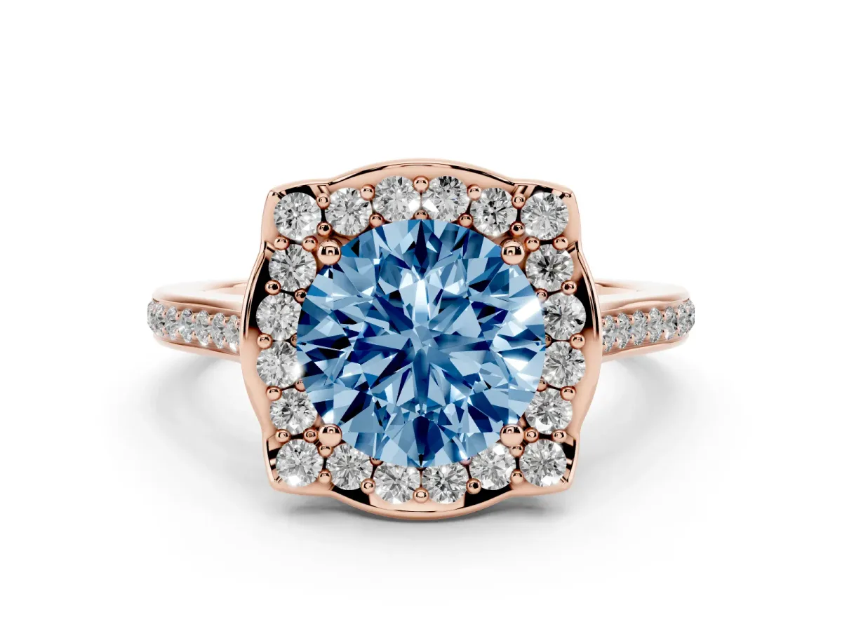 Fancy Blue Round Cut Diamond Halo Ring Set in Rose gold with Pavé-Lined Shoulders and Prong Setting
