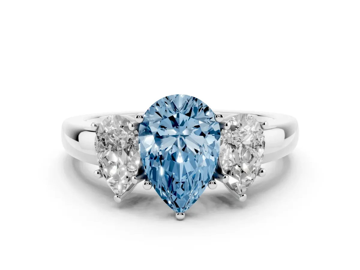 Fancy Blue Pear Cut Diamond Three-Stone Ring Set in Silver with Bold Center and Classic Band